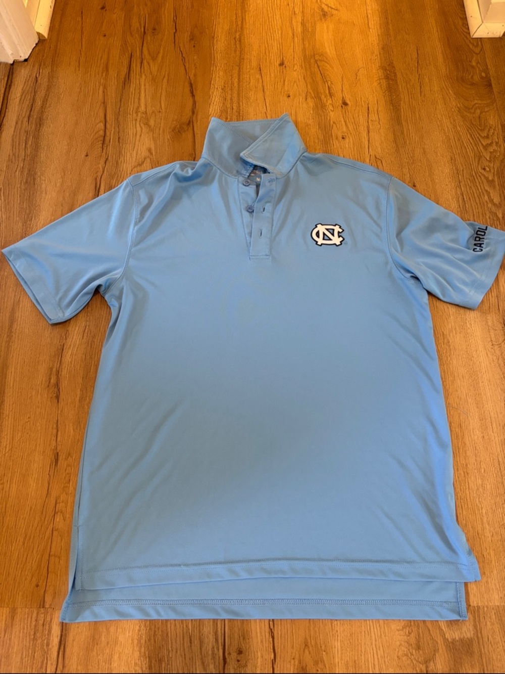 Colosseum Performance Light Blue Men's Polo with Embroidered UNC Logo